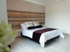 Apartasuite Laureles CMC